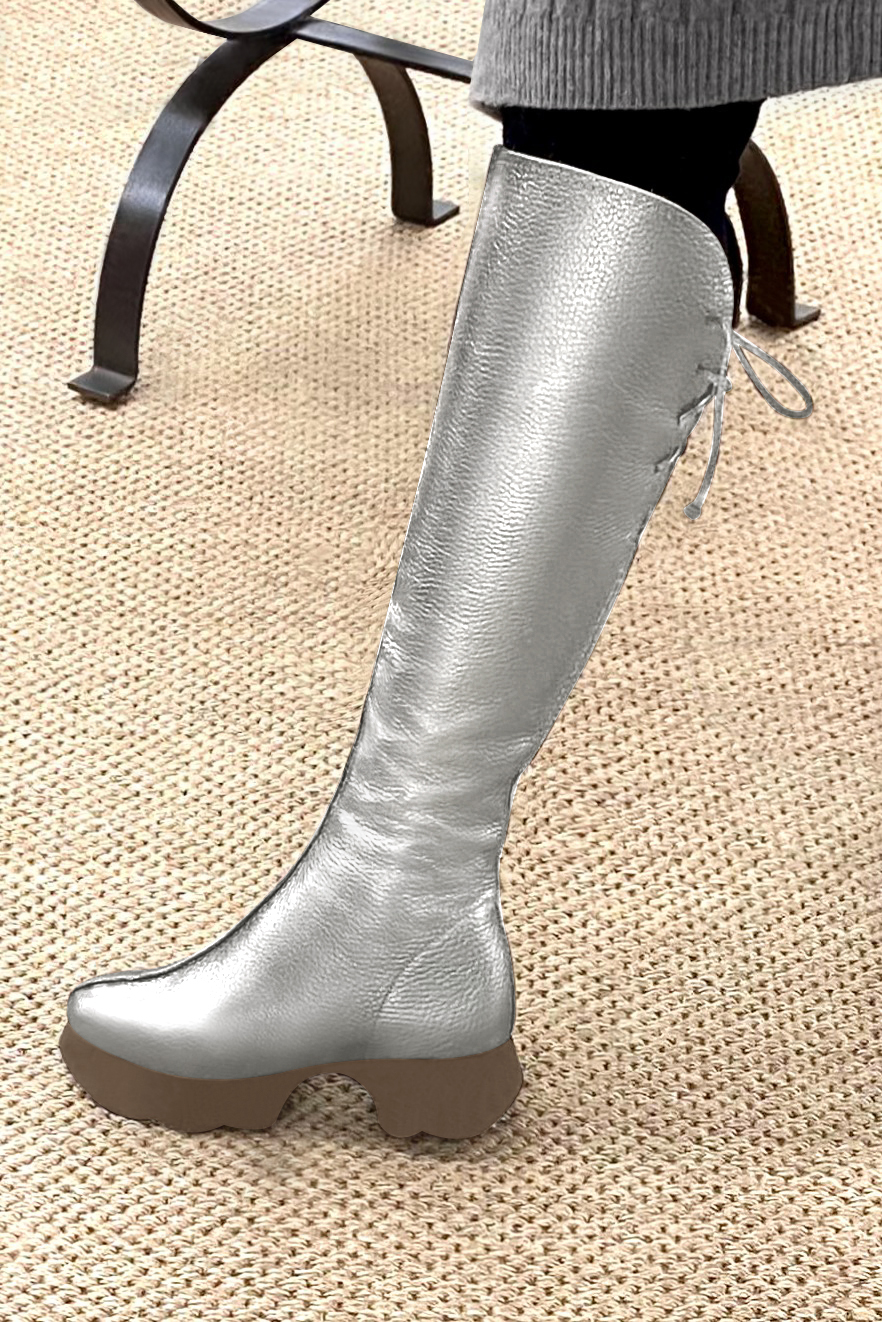 Light silver women's knee-high boots, with laces at the back. Round toe. Low rubber soles. Made to measure. Worn view - Florence KOOIJMAN